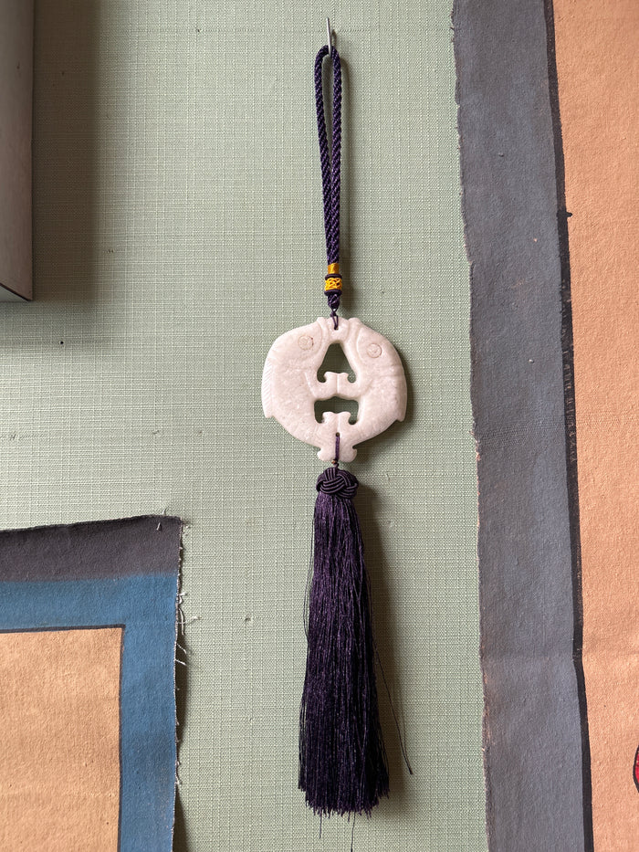 Nappina Feng shui pesci bianchi nappa viola