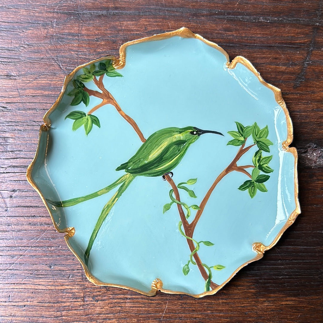 Piattino pane fondo turchese uccello verde