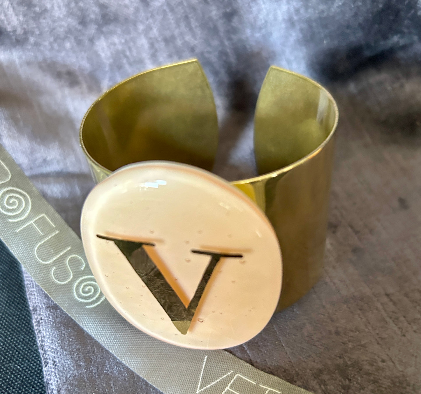 Gipsy letter V bracelet on champagne oval Daniela Poletti can be ordered