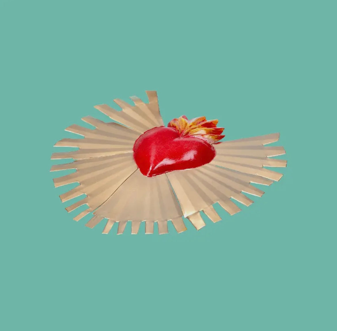 Cuore rosso ex voto con raggi
