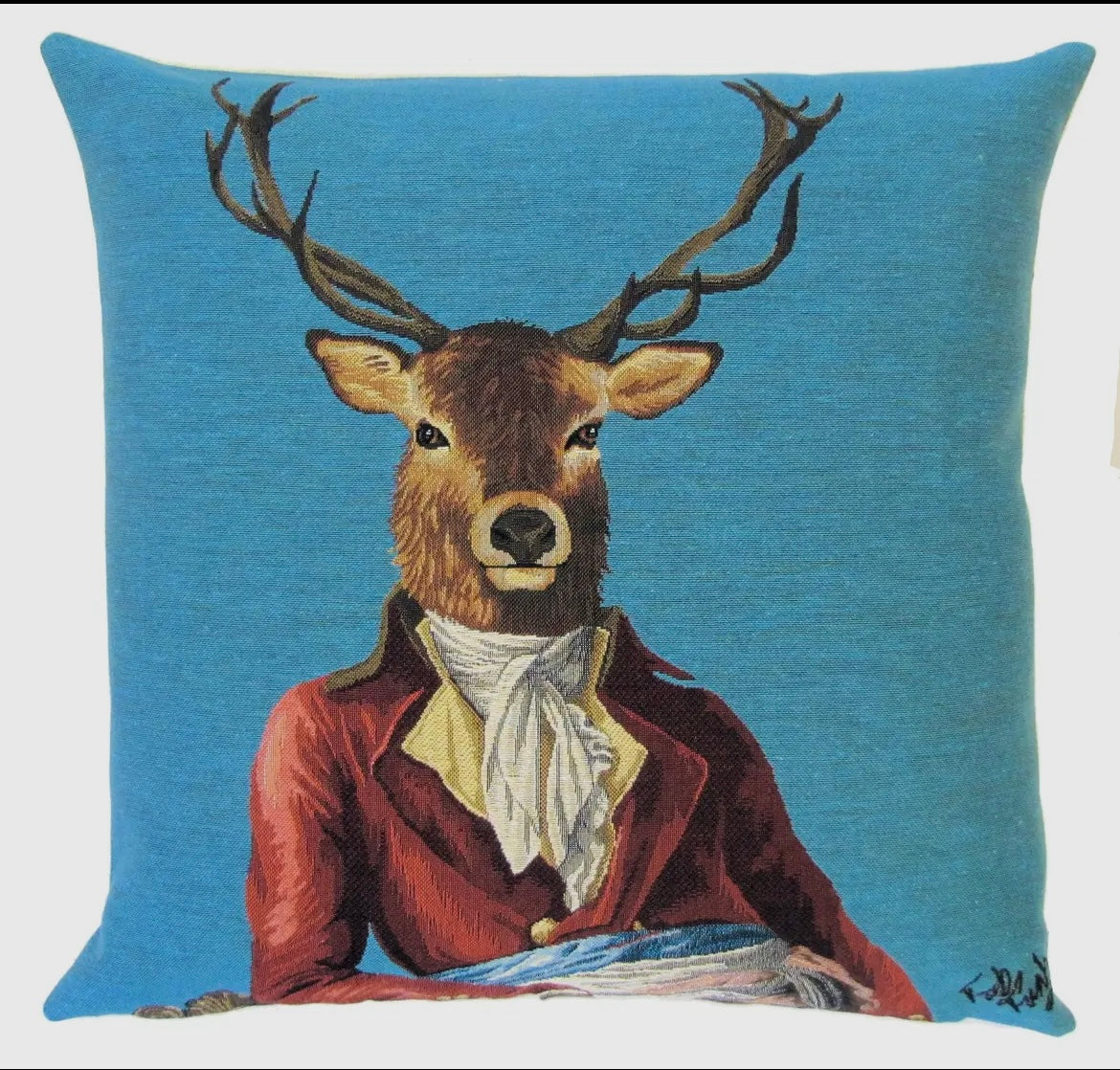 Coussin cerf sur fond bleu clair