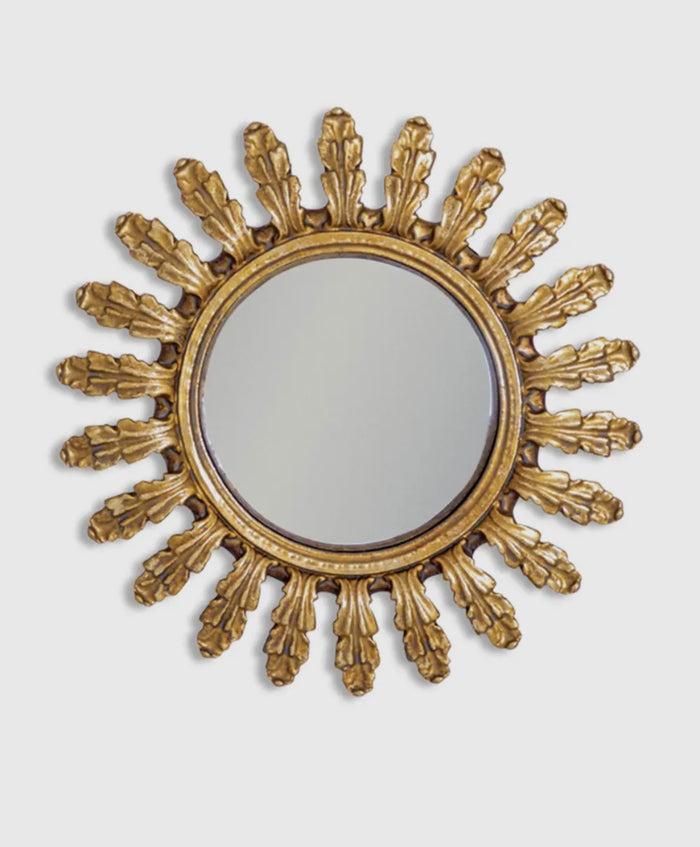 Piccolo specchio convesso con cornice ornata in oro
anticato foglie separate