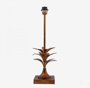 Lampe en or foncé avec base en feuille