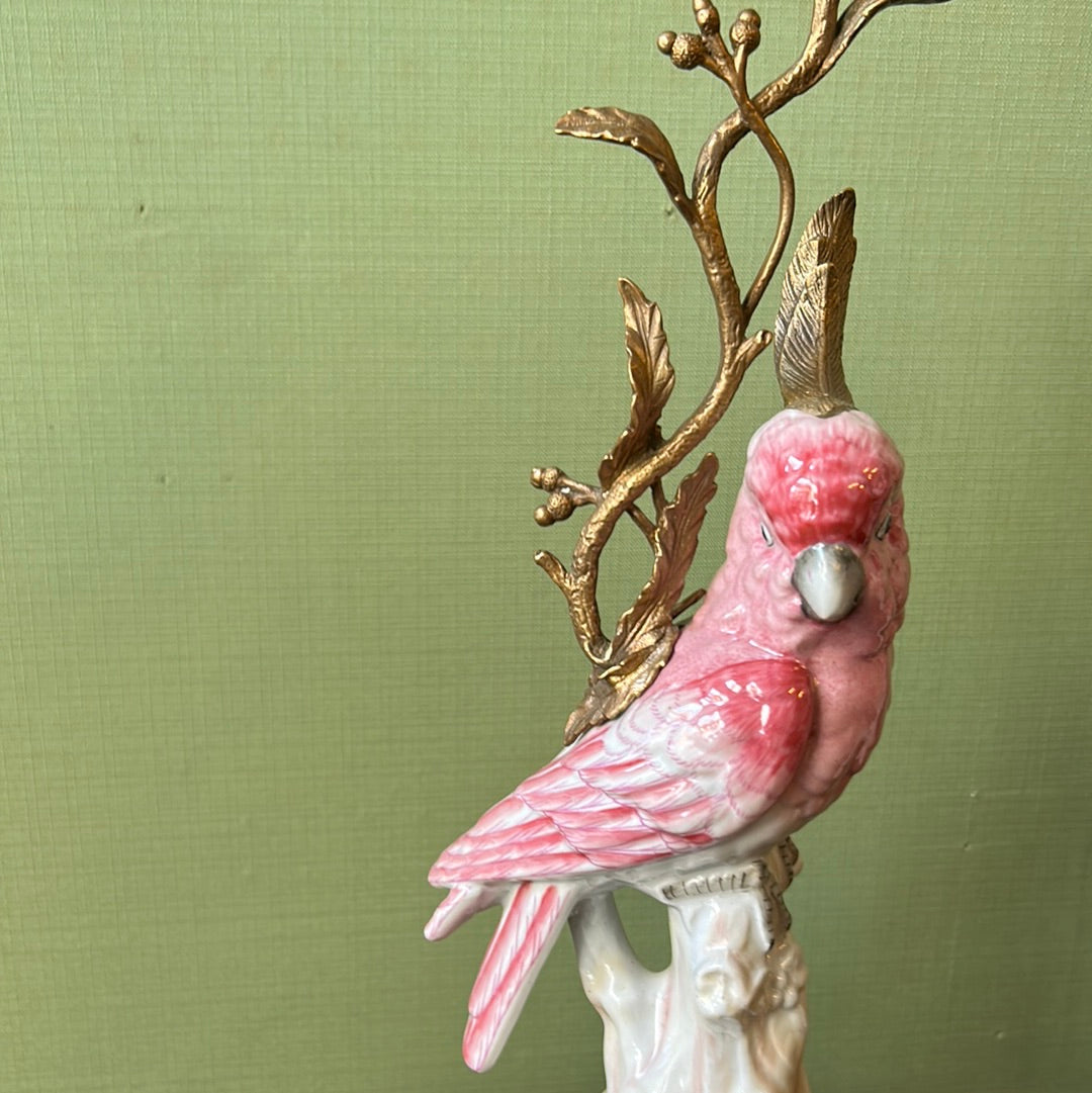 Pair of pink parrot candlesticks