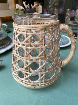 Water jug with raffia