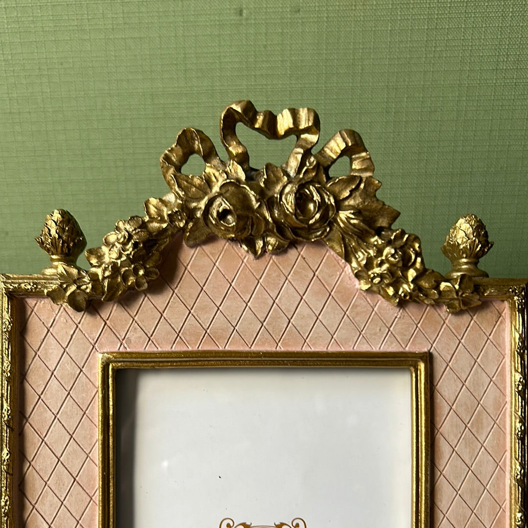 Pink and gold photo frame with bow and feet