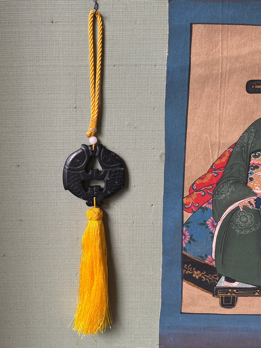 Nappina Feng shui pesci neri nappa gialla