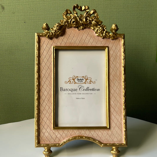 Pink and gold photo frame with bow and feet