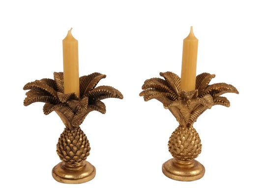 Pair of gold palm candlesticks