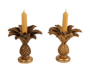 Paire de bougeoirs palmiers dorés