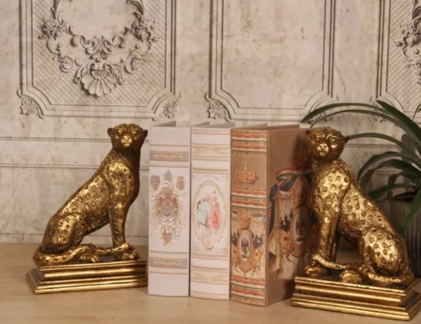 Pair of gold leopard bookends 