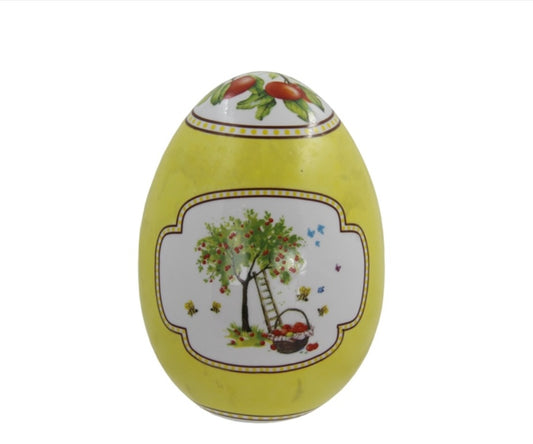 Uovo medio giallo con albero di mele