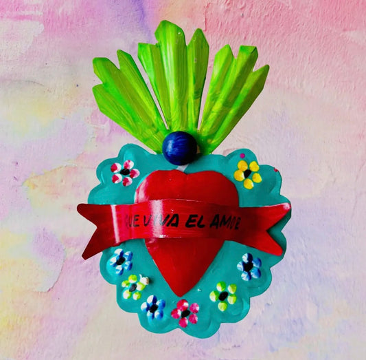 Mexican ex-voto heart with love phrase