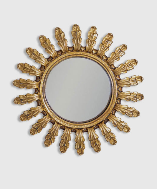 Piccolo specchio convesso con cornice ornata in oro
anticato foglie separate