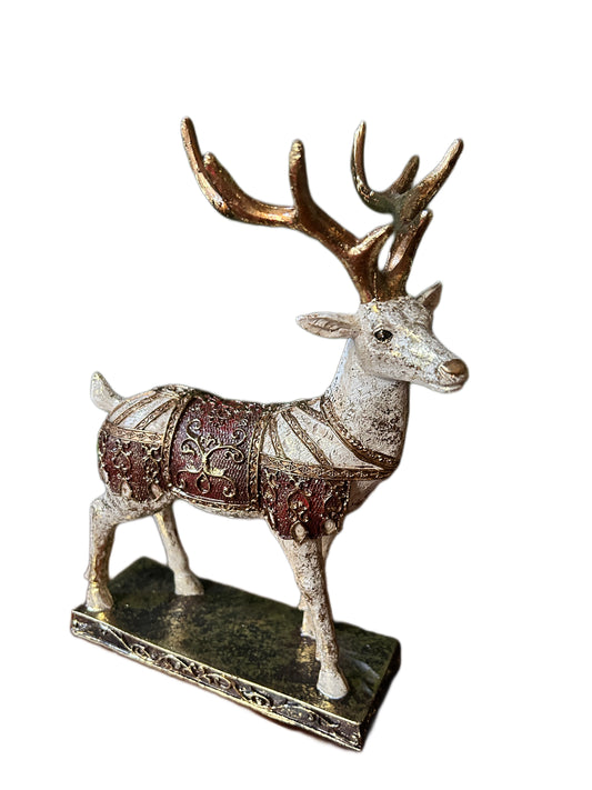 Christmas reindeer with gold decoration on the right 