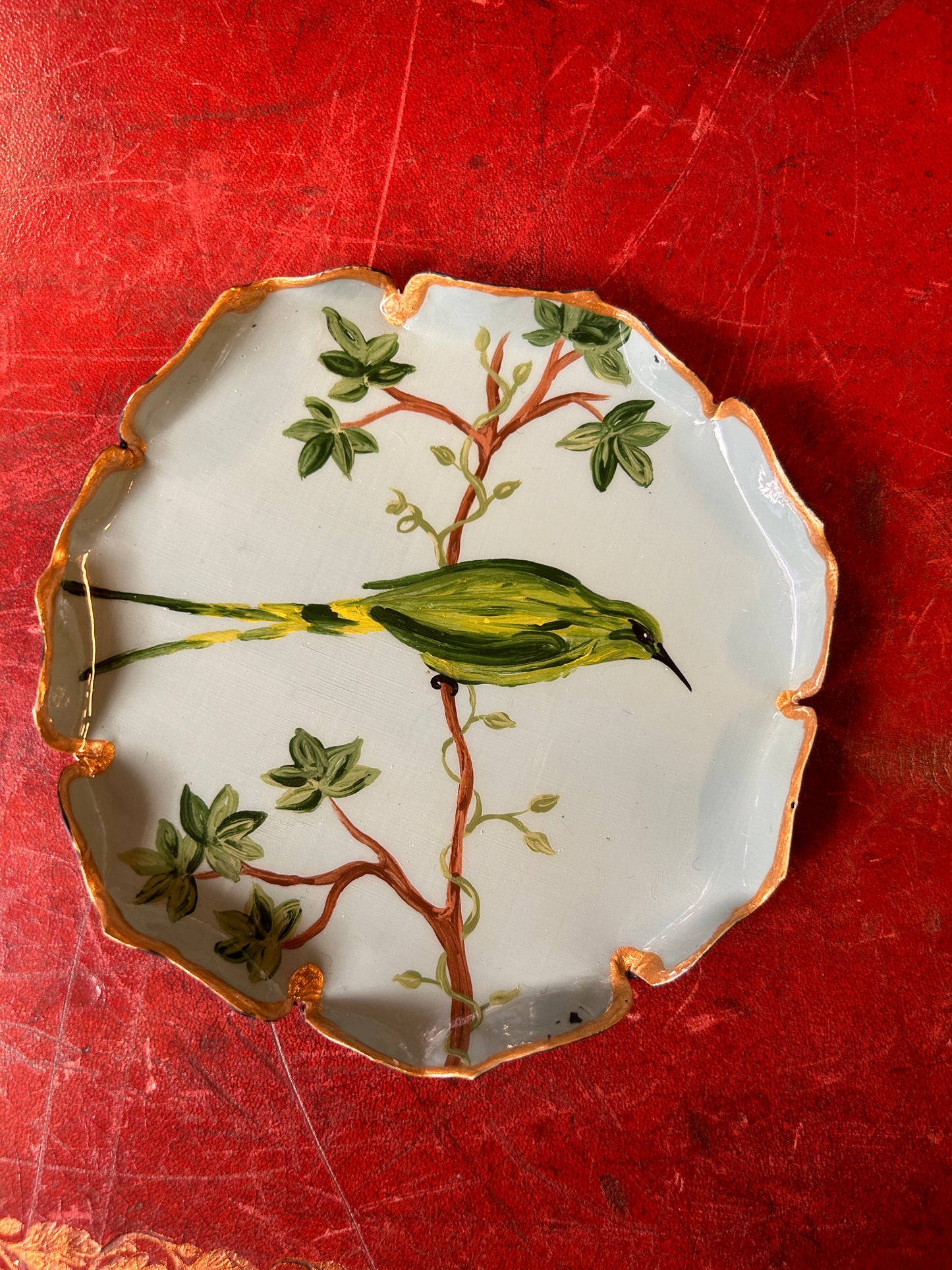 Bread plate or bird jewelry box on a light blue background