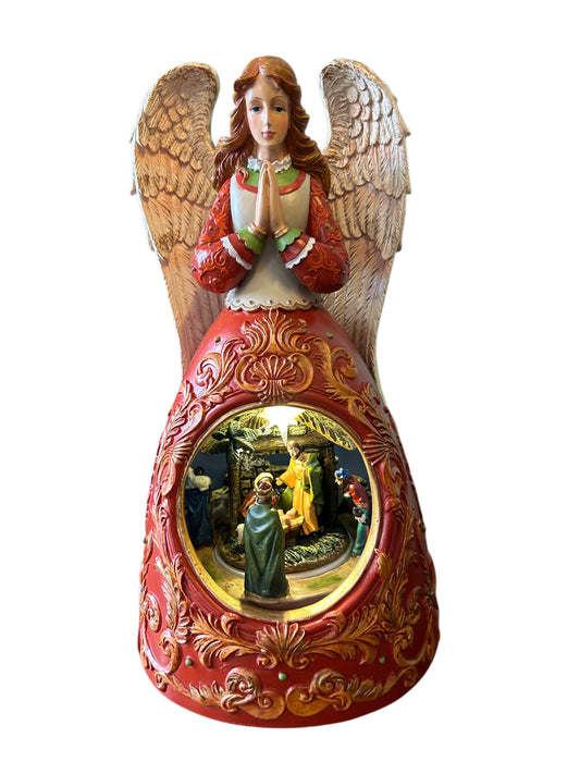 Angelo con carillon e luce presepe interno