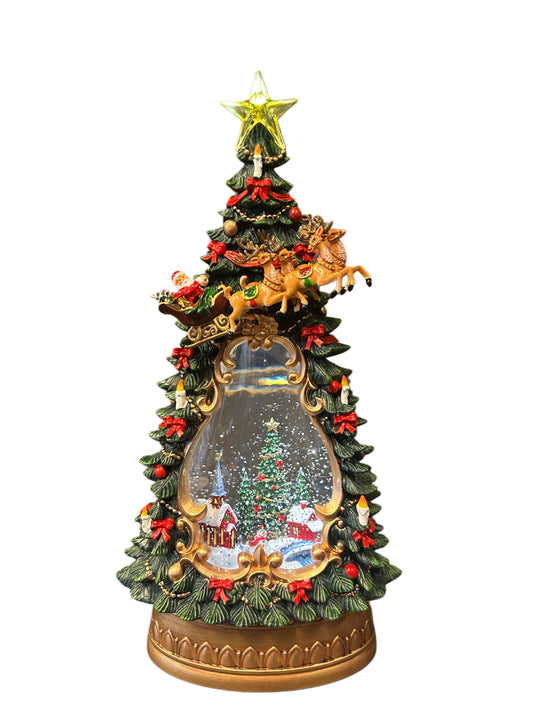 Albero con paesaggio natalizio interno con luci e musica