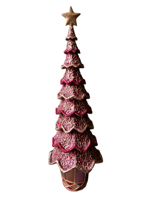 Christmas tree in large pink resin vase