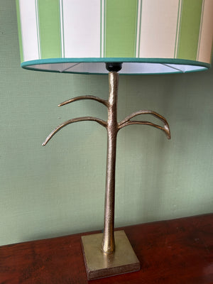Brass leaf lamp with green striped lampshade