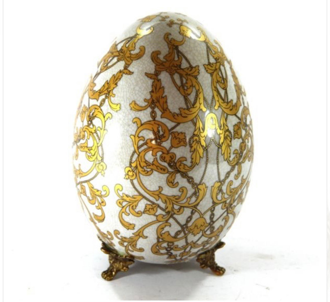 Uovo grande decoro oro con piedini in bronzo