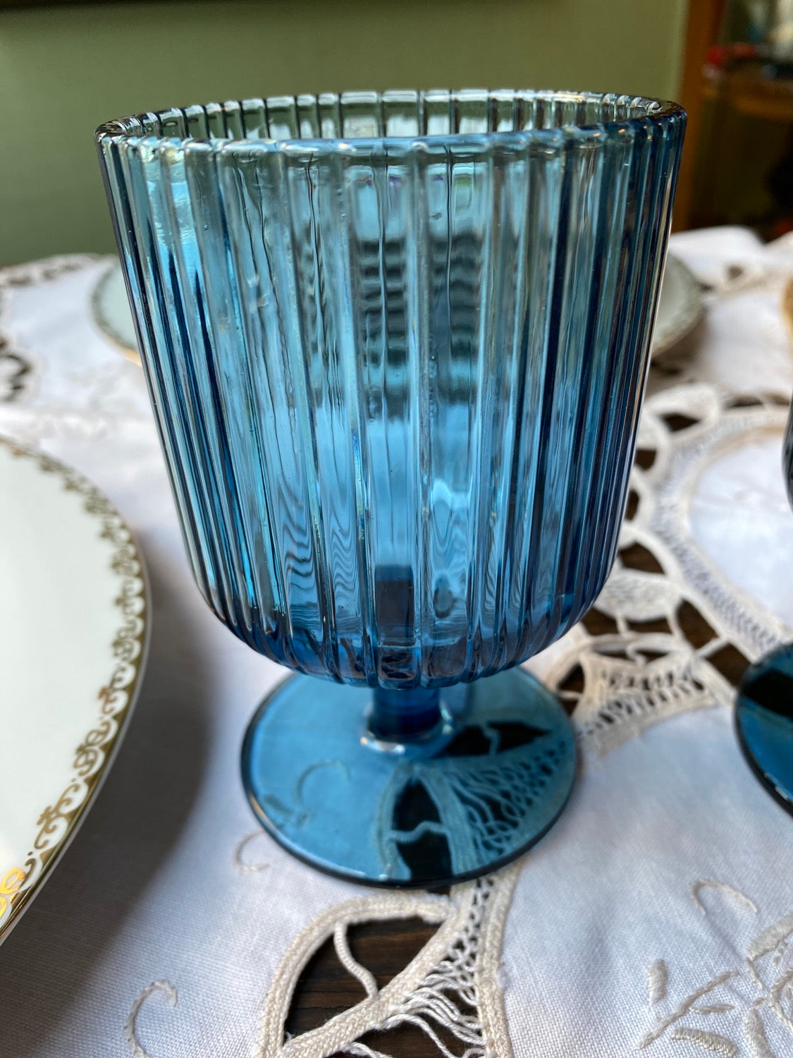 Blue ribbed wine glass