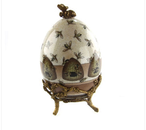 Egg with bee