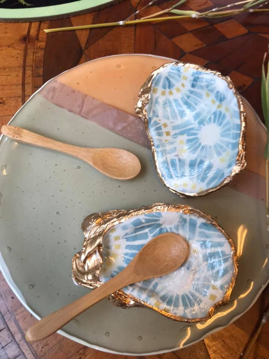 Pair of salt holders, pair of shells decorated with spoons