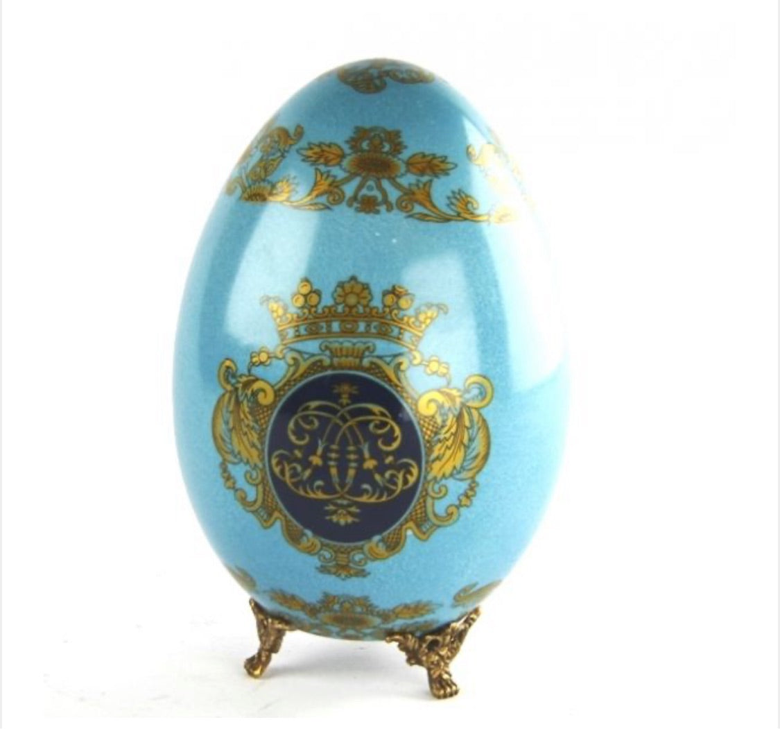 Uovo azzurro con piedini in bronzo