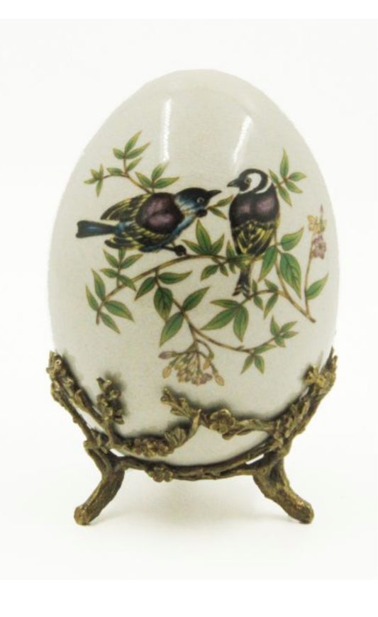 Egg with birds with bronze feet