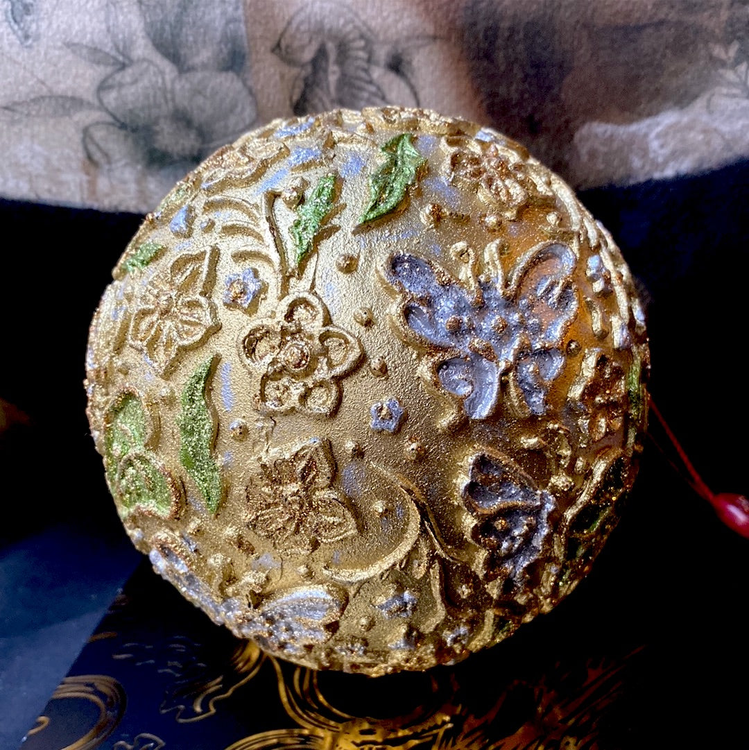 Christmas ball in gold resin