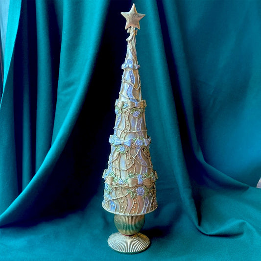 Large gold and silver Christmas tree with bows
