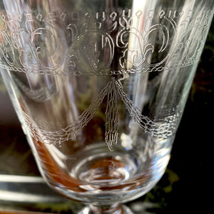 Six pantographed wine glasses