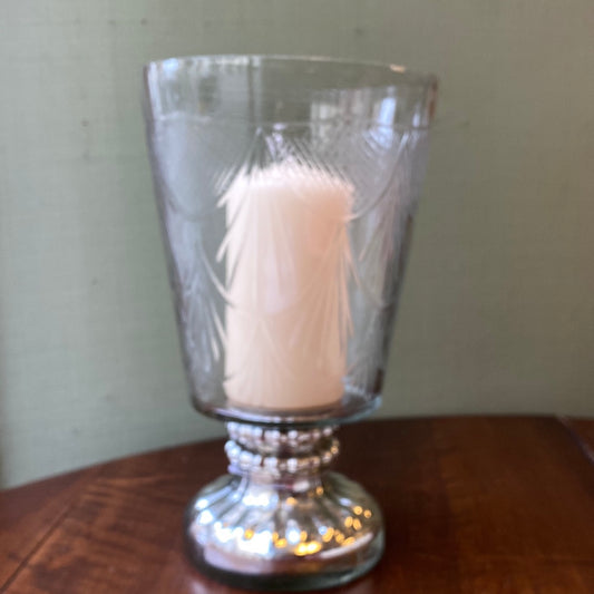 Candle holder with silver base